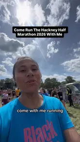 Here are a few options for your alt text (all under 125 characters):

*   **Option 1 (Descriptive):** A vegan runner filming a vlog at the Hackney Half marathon finish line in Hackney Marshes.
*   **Option 2 (Action-focused):** Vlogger recording a video recap of their experience running the 2026 Hackney Half marathon.
*   **Option 3 (SEO-focused):** A runner filming a vlog at the Hackney Half 2026 event held at Hackney Marshes.

**Pro-tip:** Since the image contains a person, including the context (filming/vlogging) and the location (Hackney Marshes) is the best way to optimize for both search engines and accessibility.