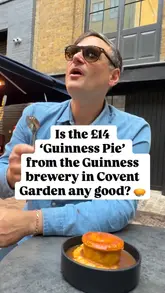 Here are a few options for your alt text:

**Option 1 (Descriptive & SEO-focused):**
A delicious Guinness beef pie crafted by Chef Calum served at the Guinness Brewery in Covent Garden, London.

**Option 2 (Action-oriented):**
Close-up of a golden-crust Guinness pie on a plate at the Guinness Brewery London restaurant in Covent Garden.

**Option 3 (Concise):**
Guinness pie served at the Guinness Brewery in Covent Garden, London.
