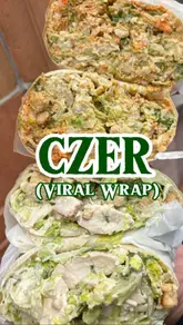 Here are a few options for your SEO alt text, depending on what the image shows:

**Option 1 (Focus on the food):**
"Close-up of a hefty viral Caesar wrap with flaming hot Doritos being prepared at Czer in Mayfair, London."

**Option 2 (Focus on the viral/location aspect):**
"A freshly made Caesar wrap from Czer at The Mayfair Food Fayre, a hidden gem inside a London convenience store."

**Option 3 (Short & punchy):**
"Viral Czer Caesar wrap being prepared with flaming hot Doritos at a convenience store in Mayfair, London."

**Tip:** Choose the one that best describes the specific action in your photo (e.g., if it's the prep, use option 1; if it's the final wrap, use option 3).