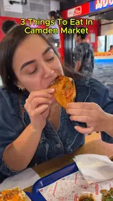 A listicle-style video featuring three food vendors in Camden Market: Mozak's (tacos, fish and chips), Hide & Bite (burgers, hot dogs), and Bubble Mania (bubble waffles). The creator samples items from each, providing a quick review and visual showcase of the food.