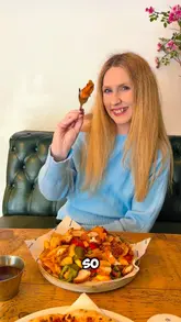 A creator visits Mad Giant Food Hall in Preston, providing a tour of the venue, showcasing the four different food vendors, the cocktail menu, and the entertainment options like the photo booth and board games.