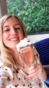 A vibrant, fast-paced reel showcasing a bottomless brunch experience at Sky Garden Bar & Restaurant. The video features shots of the rooftop setting, various cocktails and champagne, brunch dishes like burgers and fish and chips, and live entertainment from a drag performer.