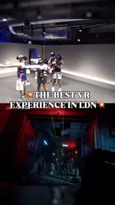 A short, high-energy reel showcasing a visit to Sandbox VR in London. The video features a group of friends wearing VR headsets and sensors, gameplay footage from a zombie-themed VR experience, and a shot of a robotic arm preparing a cocktail.