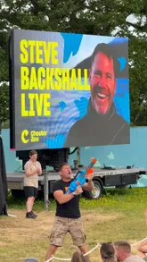 A montage video showcasing a family visit to Chester Zoo, featuring clips from a live show by Steve Backshall, various animal enclosures, and a boat ride.
