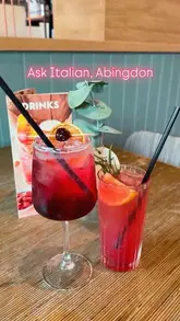 A short, visually appealing montage showcasing various dishes and drinks at Ask Italian in Abingdon, including prawns, pizza, and beef short rib, followed by a brief look at the restaurant interior and exterior.