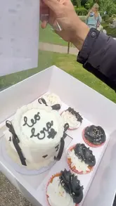A creator surprises a friend with a bento cake from a delivery service called Fastest Cakes, showcasing the product and the ease of ordering.