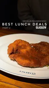 A short, polished montage showcasing a set menu at The Clarence in Glasgow, featuring close-up shots of oysters, schnitzel, pasta, cauliflower, and dessert.