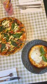 A short, engaging reel showcasing a date night at La Porchetta, featuring shots of the restaurant exterior, interior, and various Italian dishes including pizza, burrata, lasagne, and tiramisu.