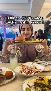 A personal video review of a restaurant called Chai and Chapati, featuring a variety of dishes including chicken cheese balls, loaded fries, a burger, and a large chocolate cake. The creator provides commentary on the food quality and portion sizes.