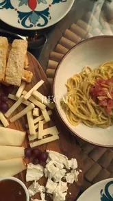 A short, fast-paced recap video featuring a variety of Italian dishes, including a cheese board, pasta, pizza, and wine, set to music.