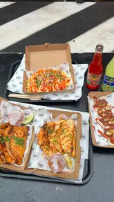 A short, energetic video showcasing a selection of birria tacos, loaded fries, and halloumi from The Taco House at Boxpark Croydon. The video features close-up shots of the food, including a cheese pull, and brief glimpses of the venue's branding.
