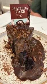 A montage showcasing the dessert-focused menu at Haute Dolci, highlighting the signature chocolate cake, savoury dishes, and mocktails.