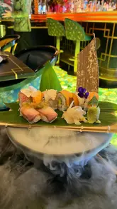A montage showcasing the interior, cocktails, and various dishes at The Ivy Asia, Leeds. The video highlights the restaurant's vibrant decor and the presentation of their tasting menu.