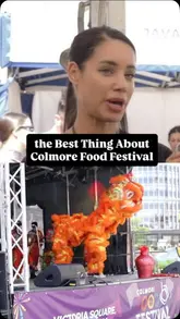 A promotional video for the Colmore Food Festival in Birmingham, featuring a creator introducing the event and showing live entertainment on stage in Victoria Square.