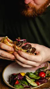 A behind-the-scenes look at a professional food photography shoot at Copper and Moss cafe, featuring high-contrast, flash-lit images of various brunch dishes and drinks.