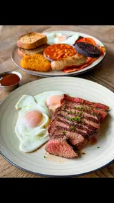A visually appealing reel showcasing a brunch experience at The Bracebridge in Sutton Park, highlighting the scenic lakeside views, cozy interior, and various brunch dishes including a full English breakfast, steak and eggs, and eggs benedict.