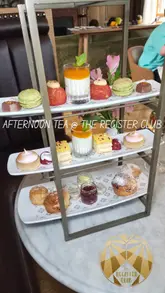 A high-quality reel showcasing 'The Grand Afternoon Tea' at The Register Club in Edinburgh. The video features close-up shots of the three-course menu, including savoury items like lamb kofta and smoked salmon bagels, a deconstructed cranachan palate cleanser, and a selection of sweet treats. The editing is clean, with text overlays detailing the menu items, providing a clear and enticing overview of the experience.