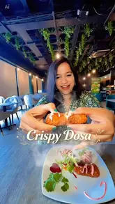 A family-focused review of Crispy Dosa, highlighting their new plant-based menu. The video features the creator and her children trying a variety of dishes, including dosas, starters, and desserts, in a casual, family-friendly setting.