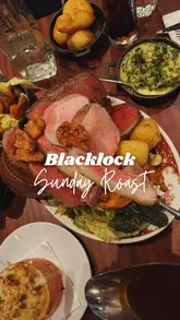 A review of a Sunday roast experience at Blacklock, featuring the 'All In' sharing platter, various sides, and mocktails. The video highlights the quality of the meat, the atmosphere of the venue, and the generous portions.