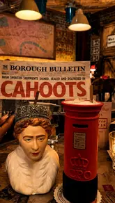 A fast-paced, immersive tour of Cahoots Postal Office in London, highlighting its 1940s theme, theatrical cocktail presentation, and vintage decor.