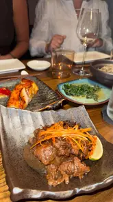 A promotional reel for Mana Mayfair, a Japanese restaurant in London, highlighting their 100% gluten-free tasting menu. The video features shots of the restaurant's interior, various dishes, and the dining experience.