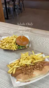A vlog-style review of a farm venue hosting an adults-only event, featuring a silent disco, go-karts, animal feeding, and casual dining options like burgers and loaded fries.
