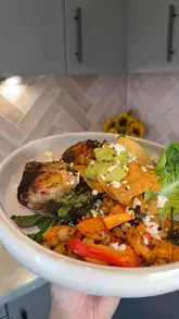 A recipe tutorial demonstrating how to cook peri peri chicken thighs with sweet potatoes and chickpeas in a Cuisinart air fryer, highlighting the product's ease of use and cleaning.