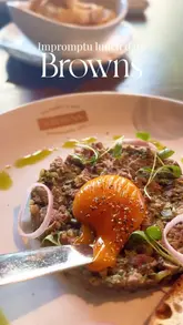 A polished montage of various dishes and the interior of Browns restaurant, highlighting the dining experience through a series of well-lit, static and slow-panning shots.