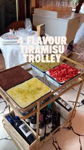 A short, punchy promotional video showcasing a tiramisu trolley experience at Barbarella in Canary Wharf. The video highlights the four available flavours and the restaurant's interior.