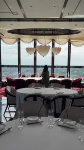 A montage showcasing the interior and food offerings at Shanghai Me, a restaurant with a view of London. The video features various dishes including dim sum, sushi, and desserts, alongside a tea service.