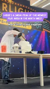 A promotional video showcasing the various interactive play zones at 'Imagine That! Wigan', featuring a child exploring different themed areas like a laundrette, construction site, and science lab.