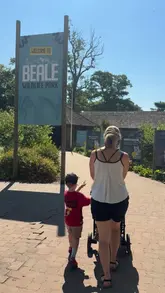 A montage of clips documenting a family visit to Beale Wildlife Park, featuring various animals, playground equipment, and a swimming pool.