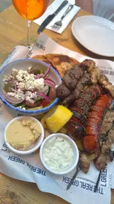 A short, punchy reel showcasing a visit to The Real Greek near Tower Bridge, highlighting the meat sharing platter and the scenic location.