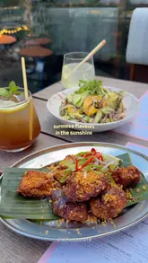 A montage showcasing Burmese dishes and drinks at Lahpet, highlighting the outdoor terrace seating and vibrant food presentation.