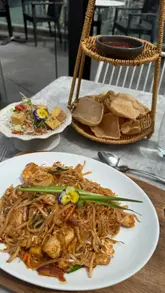 The creator takes viewers on a tour of four different food and drink venues within Eldon Square, Newcastle, framing the visit as a perfect summer foodie day. The video features quick cuts between Nando's, Chaophraya, Boost Juice, and Freight Island, highlighting specific dishes and the atmosphere of each location.