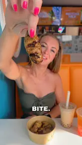 A creator visits the newly opened Captain Cluck in Waterloo, Liverpool, showcasing their menu of grilled chicken, rice bowls, wings, desserts, and boba tea.