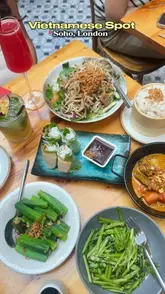 A montage-style video showcasing the interior, menu, and various dishes at a Vietnamese restaurant in Soho, London.
