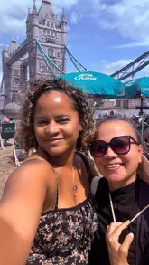 A vlog-style reel documenting a visit to the Thailand Showcase 2026 at Potters Fields Park in London. The video features shots of the event grounds, cultural performances, various Thai street food stalls, and the creators enjoying Thai iced tea, all set against the backdrop of Tower Bridge.