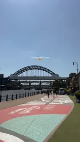 The video features a quick visit to a Boost Juice Bar, highlighting the menu and two specific drinks: the Mango Magic and the Ginger Tonic. It uses a handheld, vlog-style approach to show the location and the refreshing nature of the drinks on a sunny day.