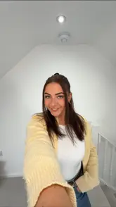 A short, vlog-style video documenting a visit to TGI Fridays. The creator highlights the new menu, specifically sharing potato skins, whiskey-glazed chicken, and chicken fajitas, while also mentioning the 2-for-1 cocktail offer. The video includes shots of the menu, the food, and the restaurant interior.