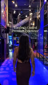 A short, atmospheric clip showcasing a walk through a premium lounge area at The O2, intended to highlight the exclusive nature of the experience. The lighting is moody and neon-heavy, fitting the venue's aesthetic, but the technical quality suffers from low-light noise and a lack of sharp focus on the subject.
