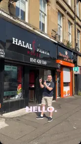 The creator visits Halal Kebab House in Glasgow to review their new menu items, showcasing the preparation of loaded fries, doner meat, and a Philly steak sandwich, alongside chicken tikka pieces.