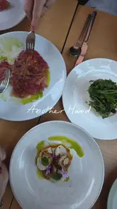 A montage of high-end, beautifully plated dishes from Another Hand in Manchester, interspersed with shots of the menu and the open kitchen.