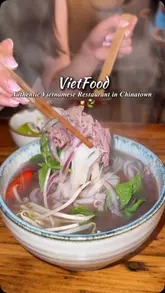 A short, fast-paced montage showcasing various Vietnamese dishes at VietFood, including pho, morning glory, bun with lemongrass pork, grilled scallops, and spring rolls.