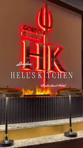 A promotional video showcasing the interior, atmosphere, and food offerings at Gordon Ramsay's Hell's Kitchen in London, located within The Cumberland Hotel.