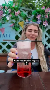 A couple visits a venue called McLarens on the Corner to enjoy their midweek drinks offer, showcasing various cocktails and beers in an outdoor seating area.