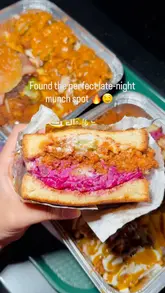 A short video showcasing a takeaway meal from Side Street, featuring a variety of comfort food items like smash burgers, loaded fries, and Nashville-style chicken. The video highlights the generous portion sizes and the late-night appeal of the venue.