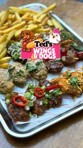 A promotional video for 'Wing Wednesday' at Ted's Wings and Dogs, highlighting their £15 unlimited wings offer for 90 minutes. The video features a variety of wing flavors, including cherry cola and salted caramel, as well as vegetarian and vegan tofu options. It showcases the venue's casual atmosphere and emphasizes the value of the deal, including a 'kids eat free' promotion.