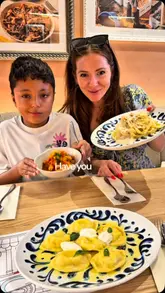 A promotional video featuring a family dining at Pasta Evangelists to try their new Summer in Amalfi menu. The video highlights various pasta dishes, a lemon-themed dessert, and cocktails, while showcasing the restaurant's relaxed, family-friendly environment.