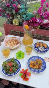 A promotional video showcasing a meal at Comptoir Libanais, highlighting the vibrant Lebanese dishes, refreshing cocktails, and the riverside setting.